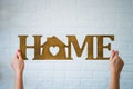 The word HOME made of wooden letter