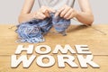 Word homework and knitting woman
