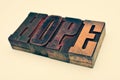 The word `hope` made of wooden typographic letters