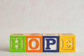 The word hope spelled with colorful blocks