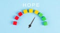 The word hope is standing on a paper, positive mindset, optimism for the future, progress bar, having faith and spirituality Royalty Free Stock Photo