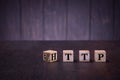 The word http on wooden cubes, on a dark background, light wooden cubes signs, symbols signs