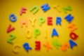 Word Hyperopia made of multi colored plastic letters