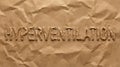 Hyperventilation Word on Crumpled Brown Paper Background Royalty Free Stock Photo