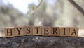 The word hysteria was created from wooden blocks. Health and life. Royalty Free Stock Photo