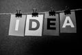 The word IDEA written on colorful note papers on board background. Idea concept Royalty Free Stock Photo