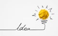 Ideas cretivity with yellow paper crumpled ball lightbulb.Creative concept. Royalty Free Stock Photo