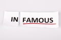 The word infamous changed to famous on torn paper