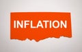The word inflation is standing on a red background, ripped paper Royalty Free Stock Photo