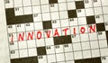 The Word INNOVATION on Crossword Puzzle Royalty Free Stock Photo