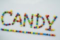 The word inscription is made of round candies Royalty Free Stock Photo