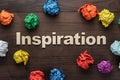 Word inspiration and crumpled colorful paper Royalty Free Stock Photo