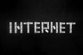 Word Internet made of connectors RJ45 , composition over the black chalkboard Royalty Free Stock Photo