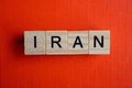 Word iran made of small gray wooden letters