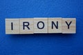Word irony made from wooden letters