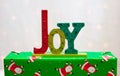 The word JOY on a Christmas present Royalty Free Stock Photo