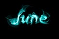 Word June on a black background smoke effect Royalty Free Stock Photo