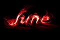 Word June on a black background smoke effect Royalty Free Stock Photo