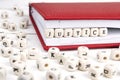 Word Justice written in wooden blocks in red notebook on white w Royalty Free Stock Photo