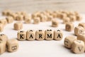 Word Karma made of cubes with letters on white table Royalty Free Stock Photo