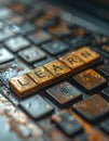 The word Learn on a rusty old keyboard Royalty Free Stock Photo