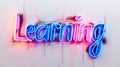 The word Learning isolated on white background made in Neon Calligraphy style. Royalty Free Stock Photo