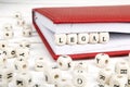 Word Legal written in wooden blocks in red notebook on white woo Royalty Free Stock Photo