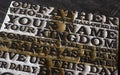 Word of the Lord`s Prayer on the old black weathered wooden pla Royalty Free Stock Photo