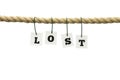 Word - Lost - hanging from a rope over white