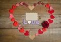 Word Love composition and handmade hearts around