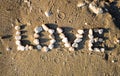 Word love made from sea stones Royalty Free Stock Photo