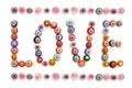The word love made of small colored beads