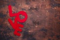 Word Love on old wooden background Red textile letters Banner Copy space Royalty Free Stock Photo
