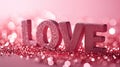 The word love is spelled with glitter on a pink background