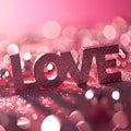 The word love is spelled with glitter on a pink background