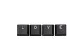 Word love written on keyboard. Isolated on white Royalty Free Stock Photo