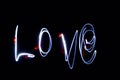 Word love written in lights.emotions romantic love written in the sky