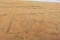 Word love written on sand, Goa Royalty Free Stock Photo