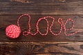 Word love written with woolen thread. Royalty Free Stock Photo
