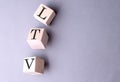Word LTV on wooden block on the grey background Royalty Free Stock Photo