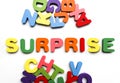 Word made from colorful wooden letters - SURPRISE isolated on white background. word art with surprize text. SURPRIZE. Prize Royalty Free Stock Photo