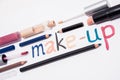 Word make-up written on white surface Royalty Free Stock Photo