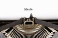 The word `Mania` from a typewriter on white Royalty Free Stock Photo