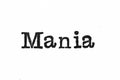 The word `Mania` from a typewriter on white