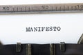 Word manifesto typed on typewriter Royalty Free Stock Photo