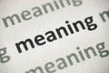 Word meaning printed on paper macro Royalty Free Stock Photo