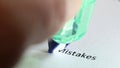 The word mistakes. The act of erasing or fixing  a mistake Royalty Free Stock Photo