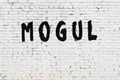 White wall with black paint inscription mogul on it Royalty Free Stock Photo
