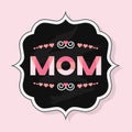 Word MOM with capital letters on retro chalk badge