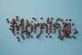 The word 'Morning' spelled out with rich, aromatic coffee beans